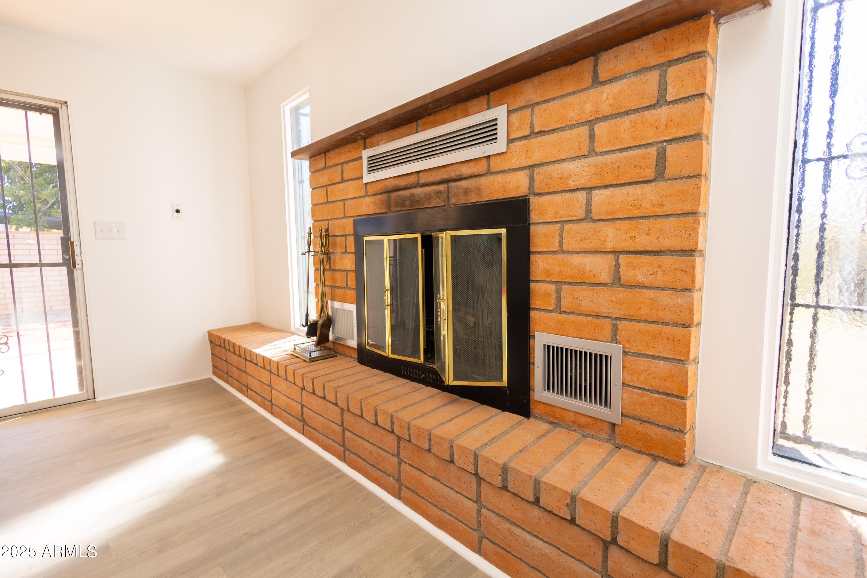 1301 East 14th Street Douglas, AZ 85607 - Photo 41 of 45 a living room with a bed and next to a window
