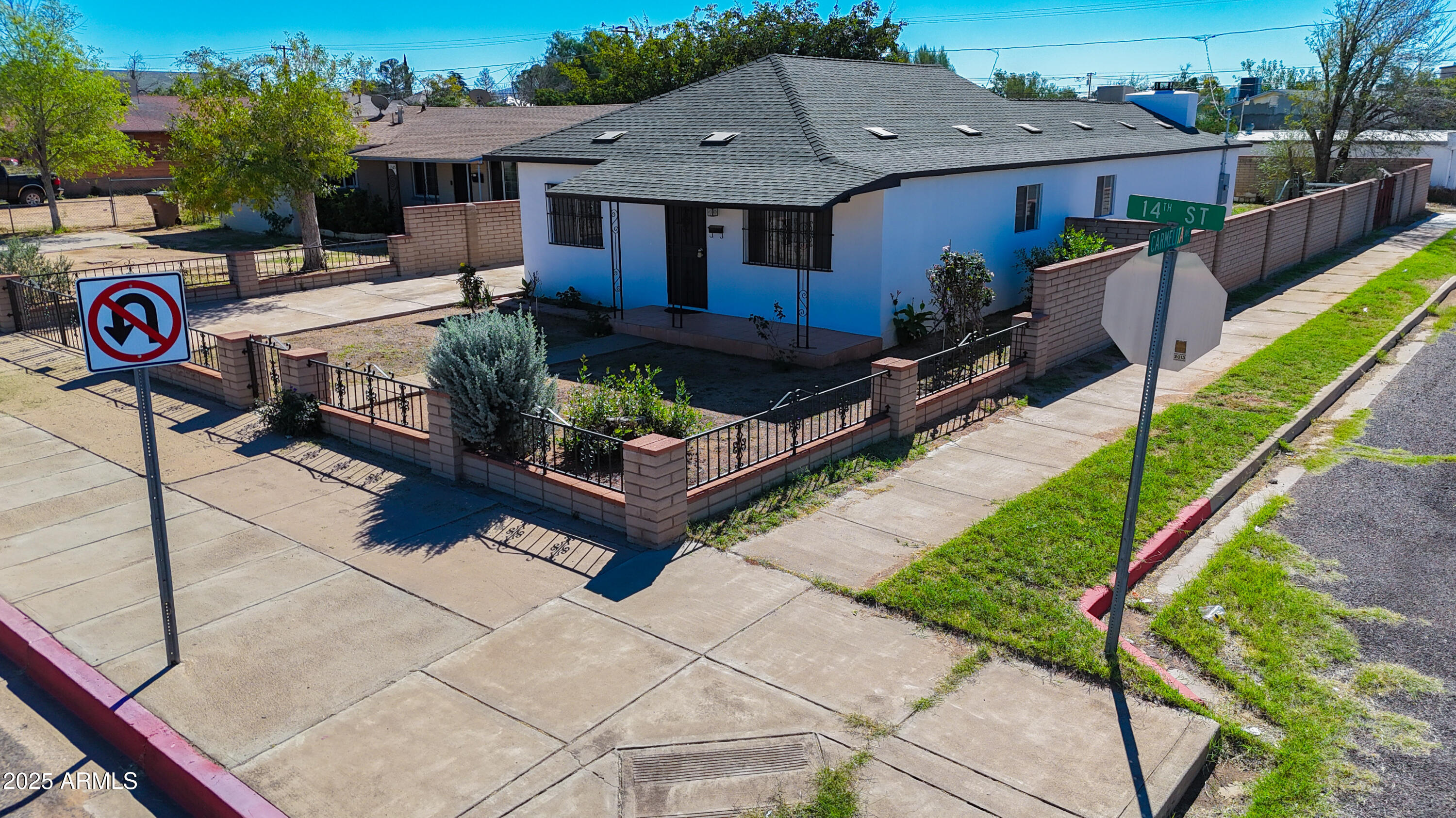 1301 East 14th Street Douglas, AZ 85607 - Photo 5 of 45 a front view of house with yard and outdoor seating