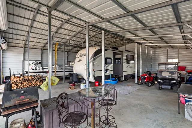 a view of a garage with furniture