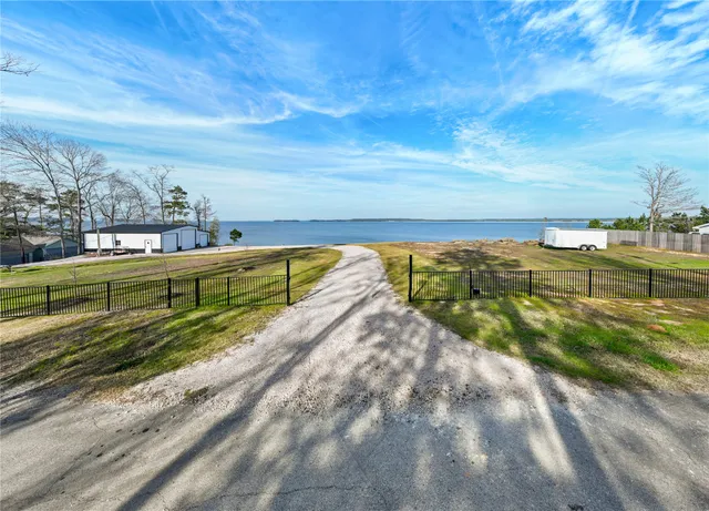 a view of a swimming pool with an outdoor seating