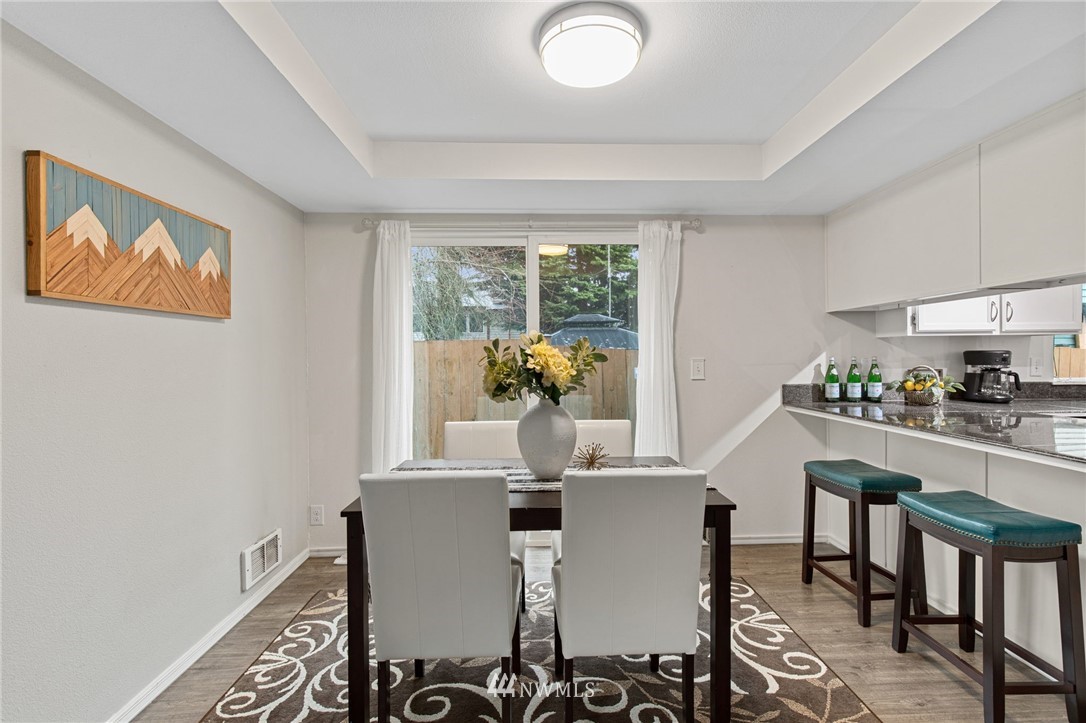 18505 20th Drive Southeast Bothell, WA 98012 - Photo 7 of 35 a dining room with furniture and window