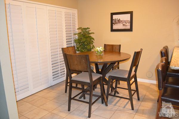 1934 Rory Lane, Unit 4 Simi Valley, CA 93063 - Photo 6 of 15 a view of a dining room with furniture and a window