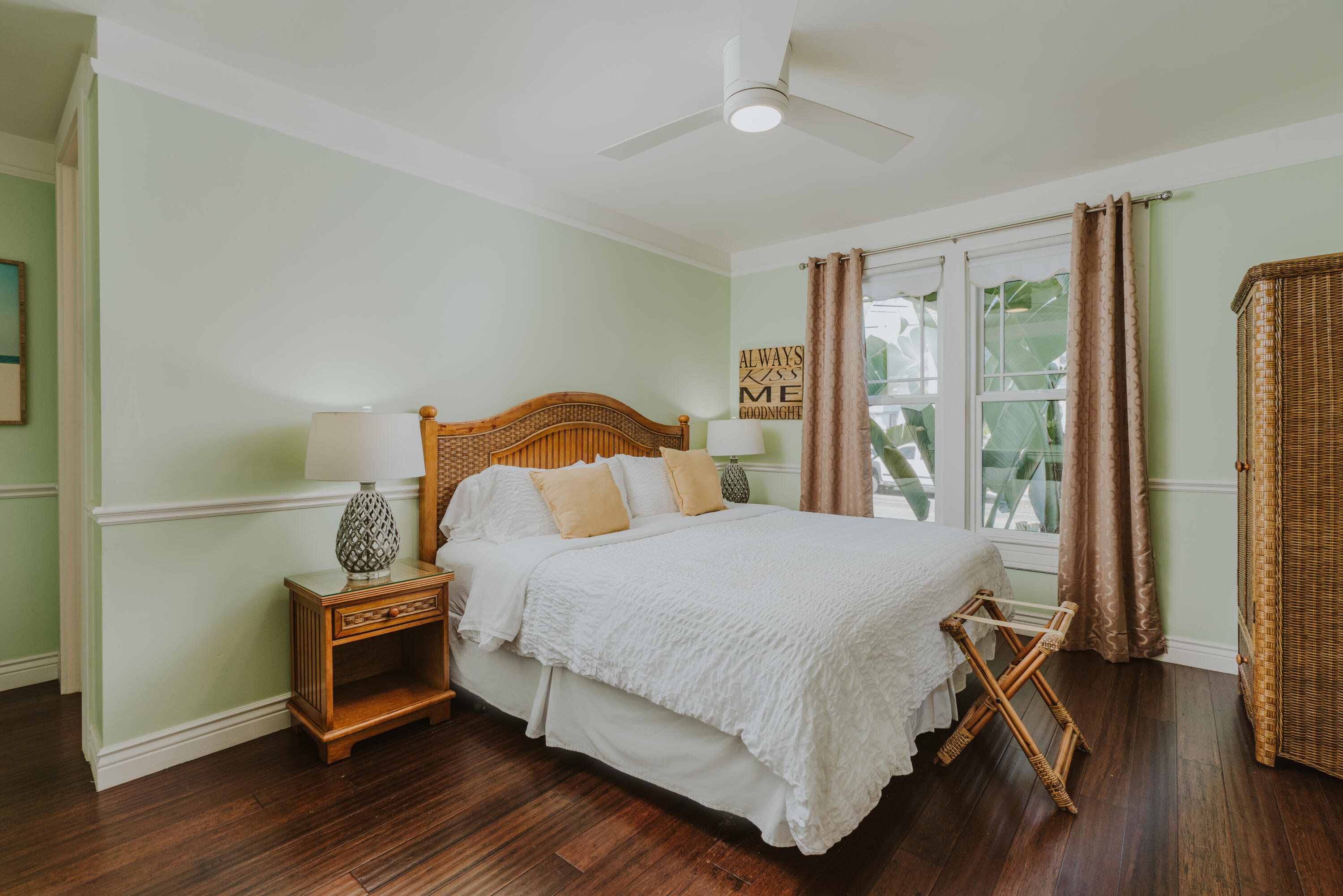 502 Brinkerhoff Avenue Santa Barbara, CA 93101 - Photo 19 of 34 a bedroom with a bed and wooden floor