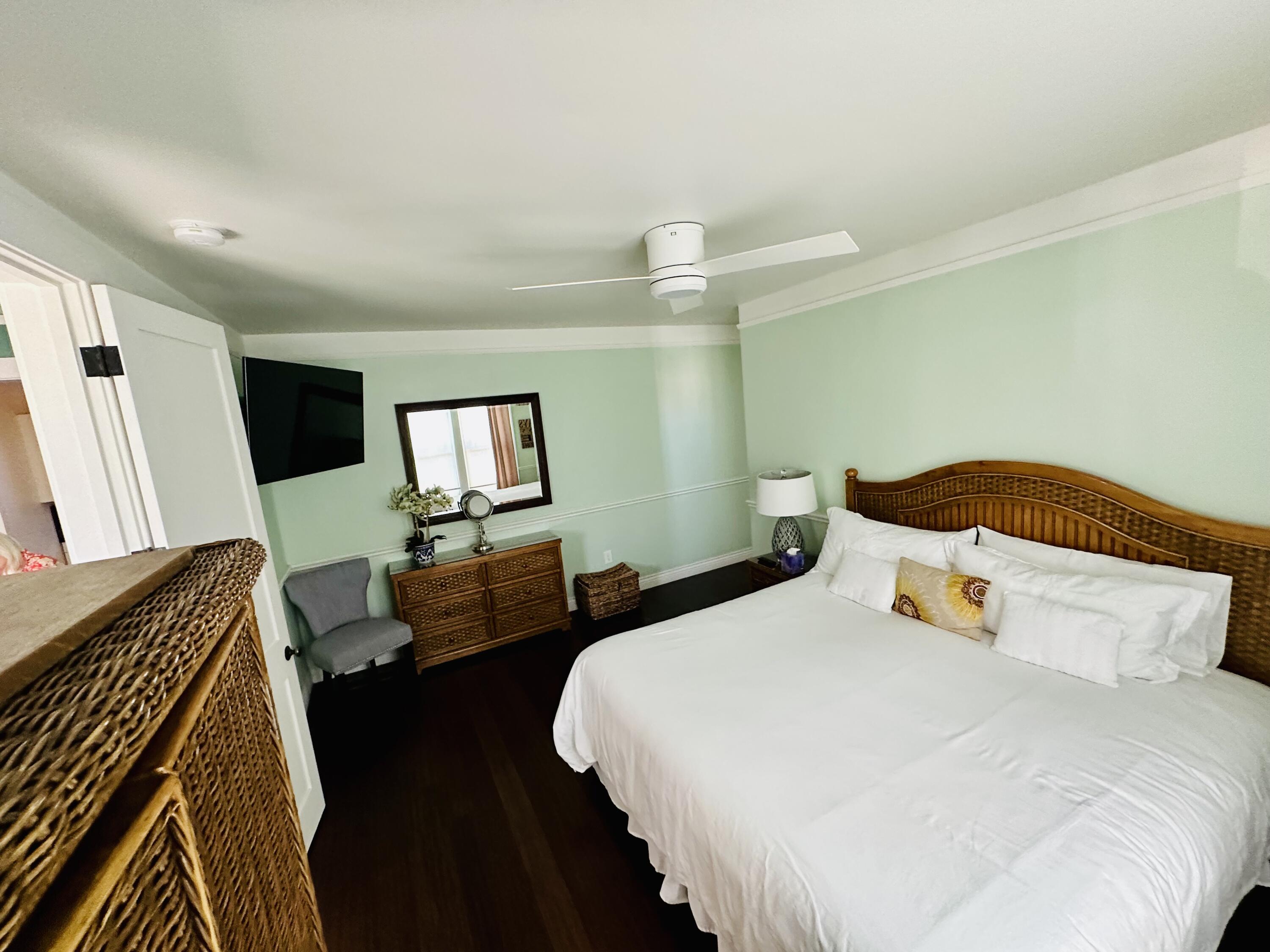 502 Brinkerhoff Avenue Santa Barbara, CA 93101 - Photo 20 of 34 a bedroom with two beds and a flat screen tv