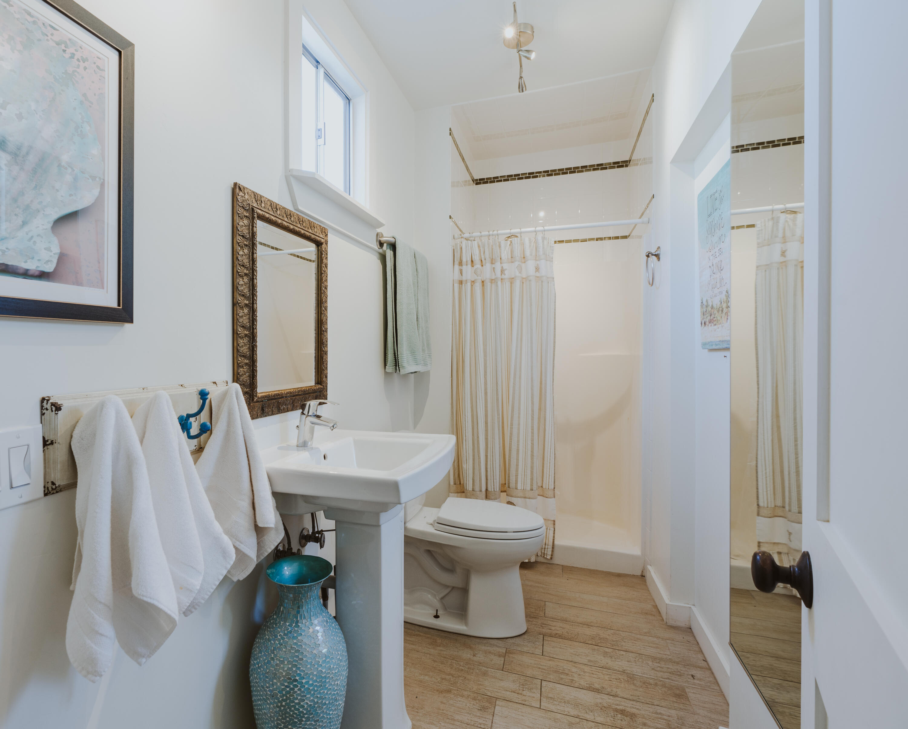 502 Brinkerhoff Avenue Santa Barbara, CA 93101 - Photo 21 of 34 a bathroom with a sink toilet and shower