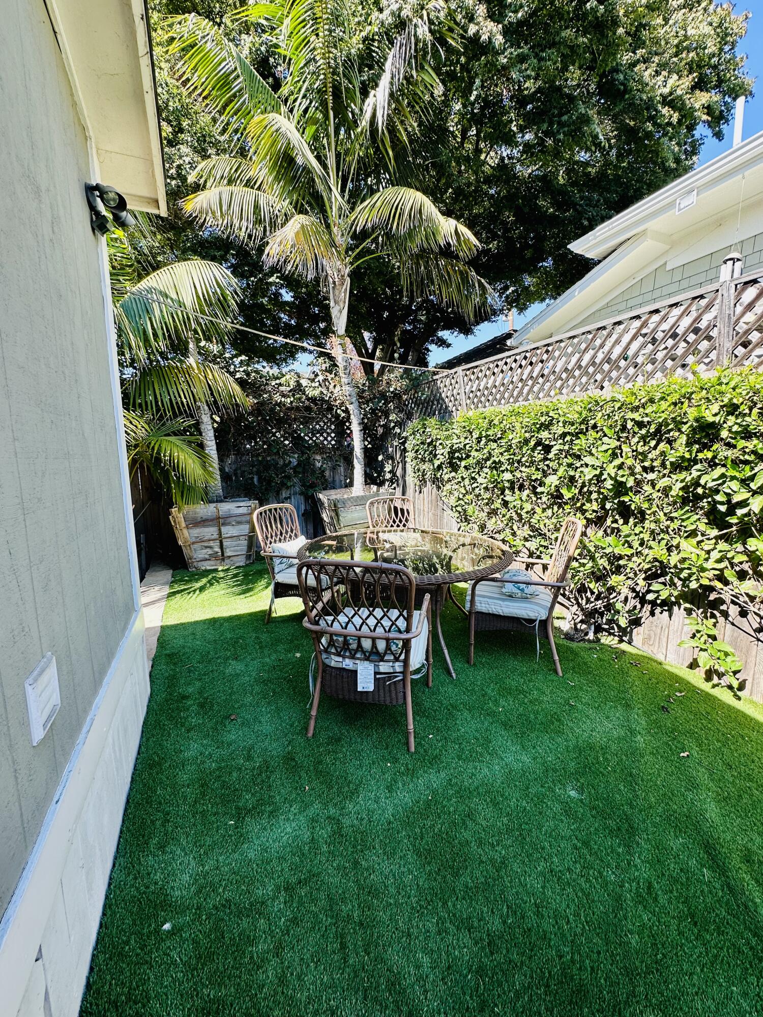 502 Brinkerhoff Avenue Santa Barbara, CA 93101 - Photo 28 of 34 a view of a chair and table in the garden
