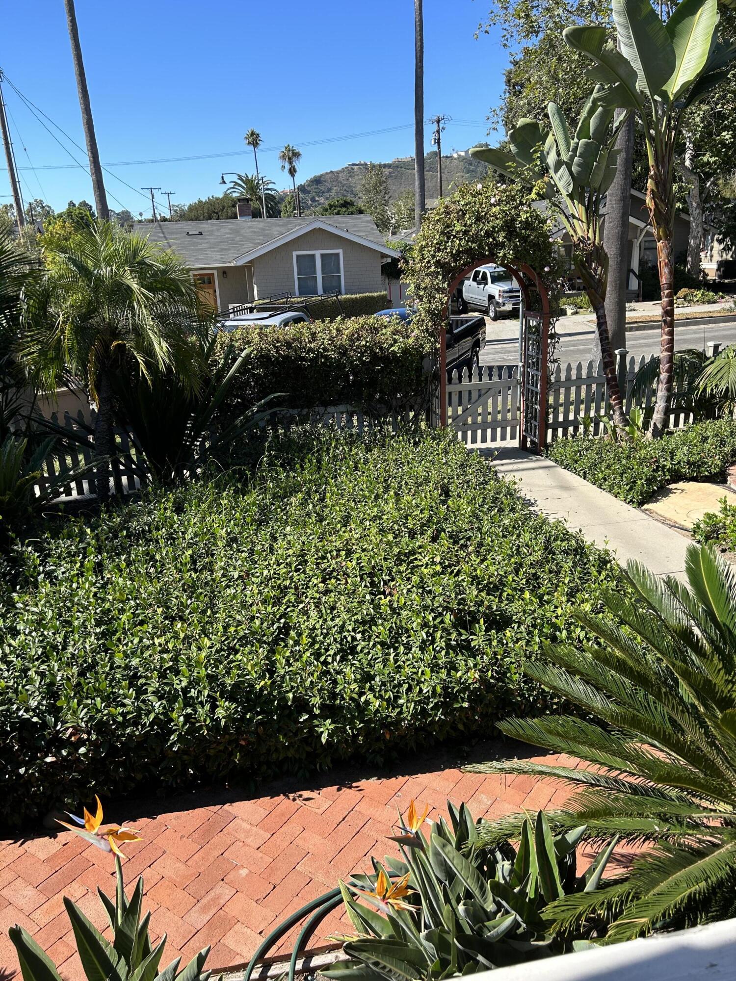 502 Brinkerhoff Avenue Santa Barbara, CA 93101 - Photo 32 of 34 a view of a garden with a house