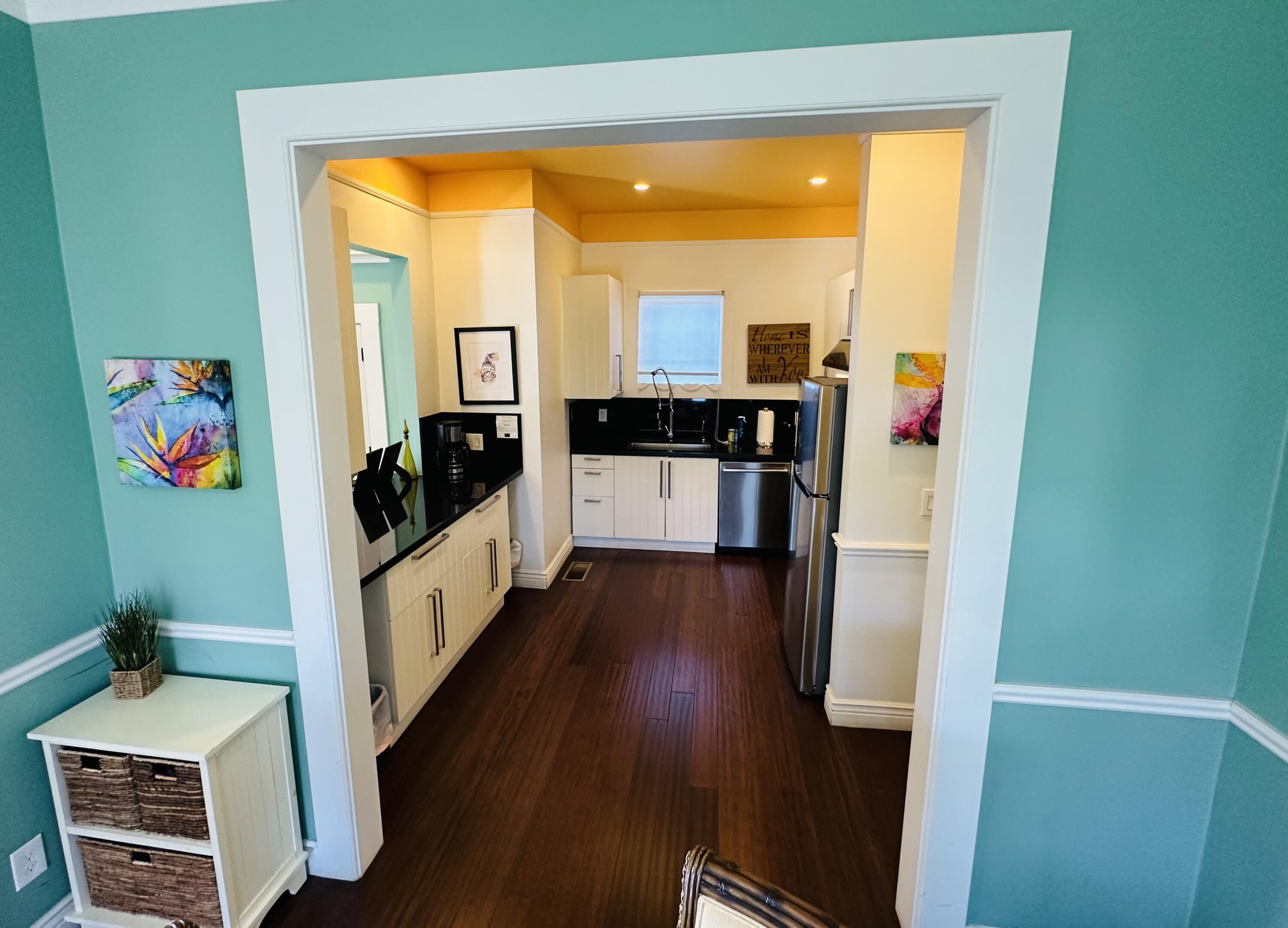 502 Brinkerhoff Avenue Santa Barbara, CA 93101 - Photo 9 of 34 a view of a living room with furniture and wooden floor