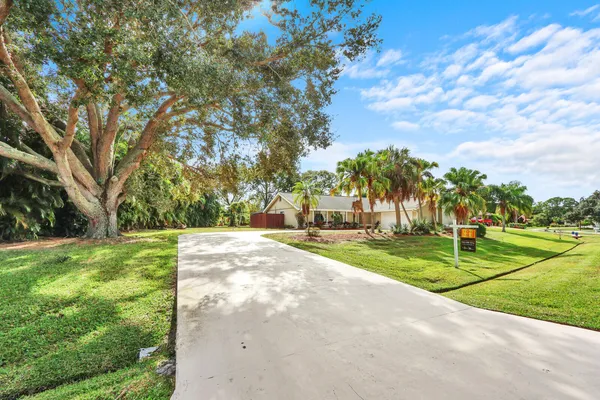 a view of a playground with basketball court