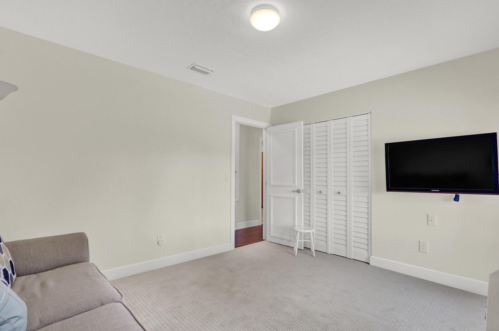 3060 Southeast Darien Road Port St. Lucie, FL 34952 - Photo 25 of 56 a view of room with furniture and a flat screen tv