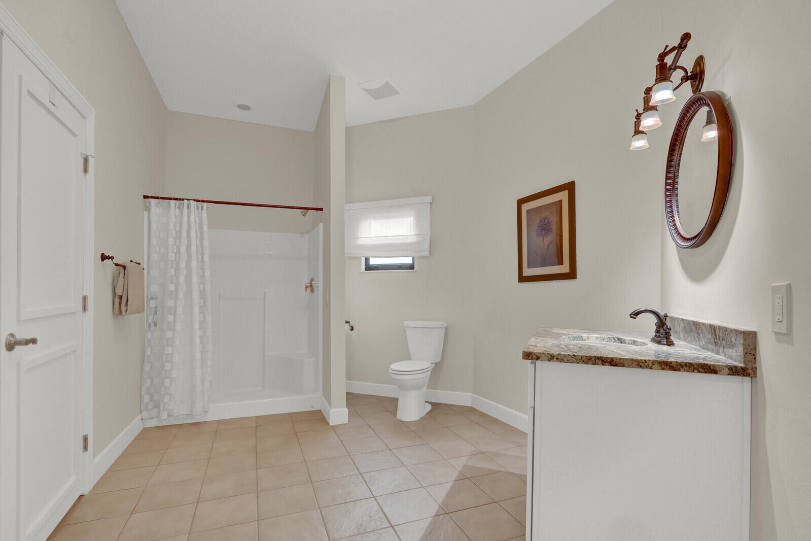 3060 Southeast Darien Road Port St. Lucie, FL 34952 - Photo 29 of 56 a bathroom with a toilet sink and mirror