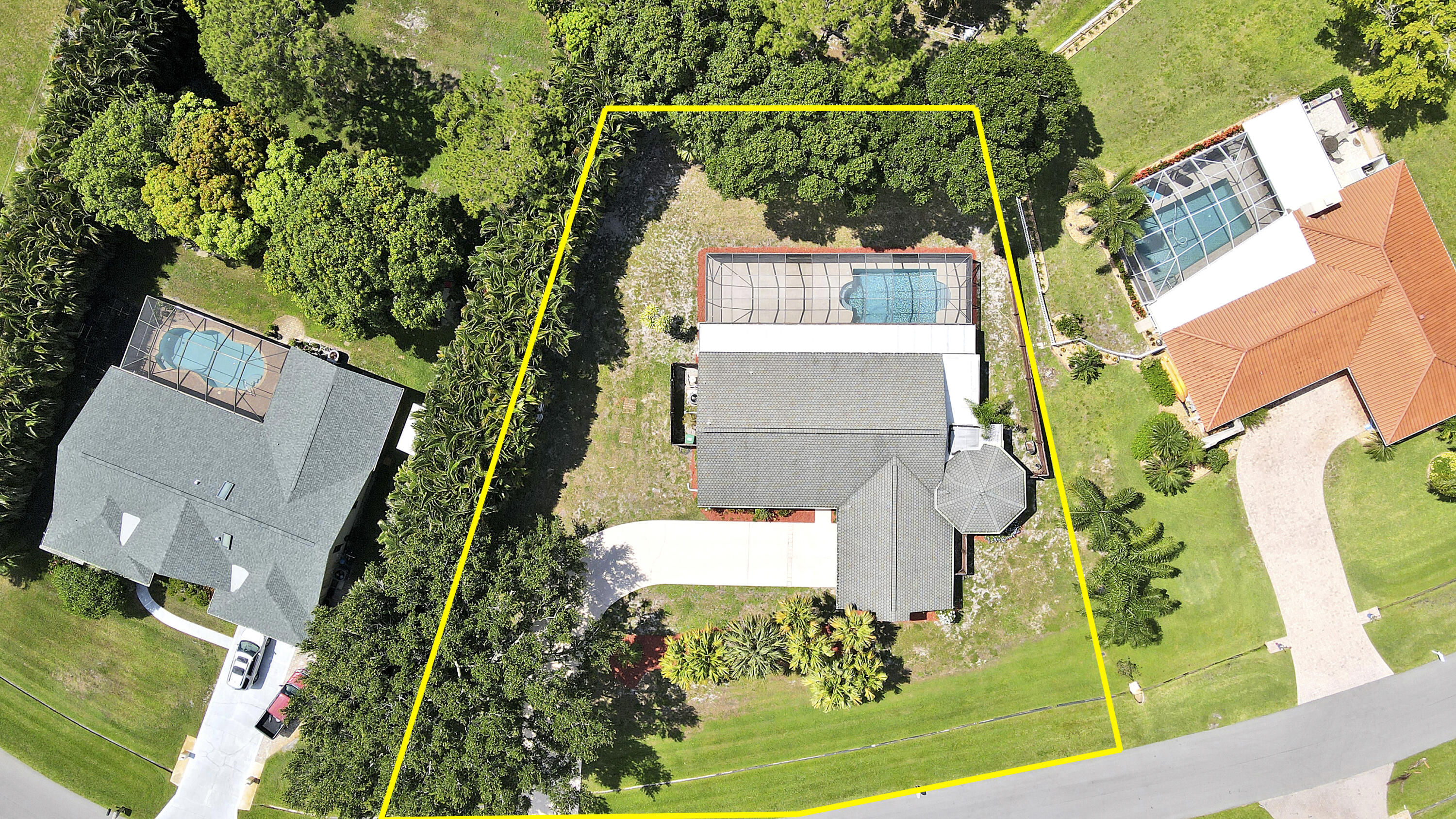 3060 Southeast Darien Road Port St. Lucie, FL 34952 - Photo 48 of 56 an aerial view of a house with a garden