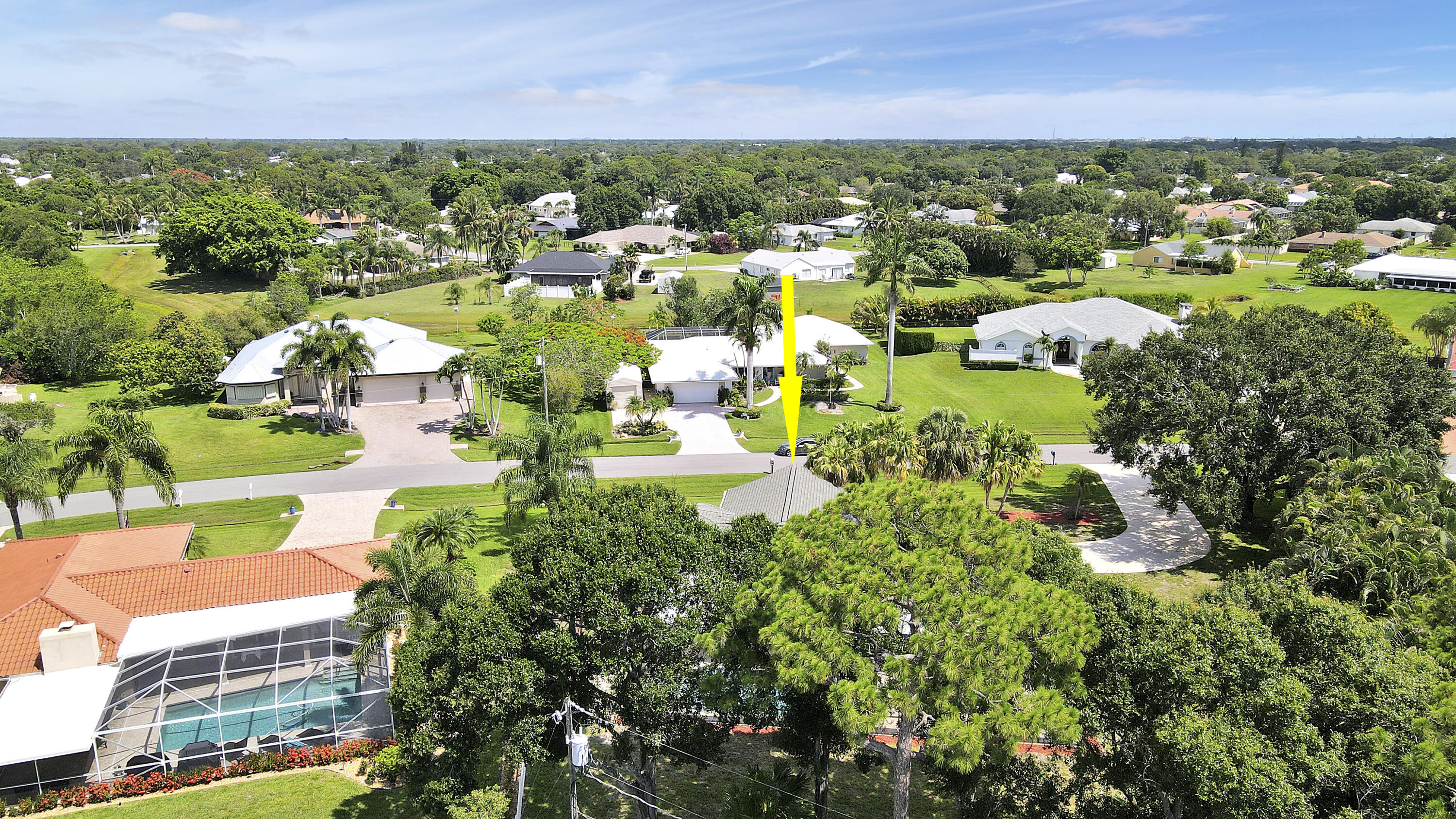 3060 Southeast Darien Road Port St. Lucie, FL 34952 - Photo 49 of 56 an aerial view of residential houses with outdoor space and trees