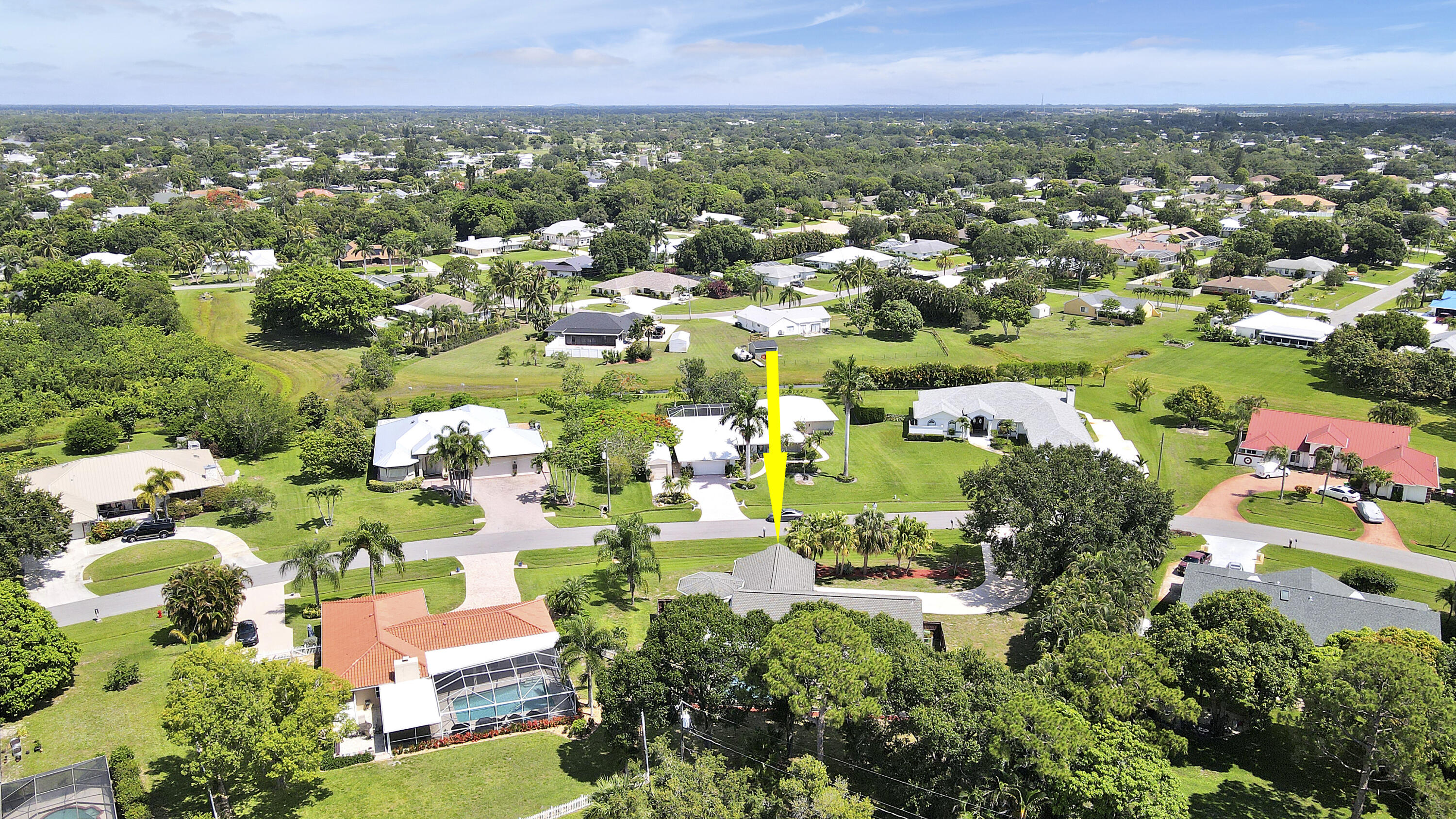 3060 Southeast Darien Road Port St. Lucie, FL 34952 - Photo 50 of 56 an aerial view of residential houses with outdoor space and trees all around