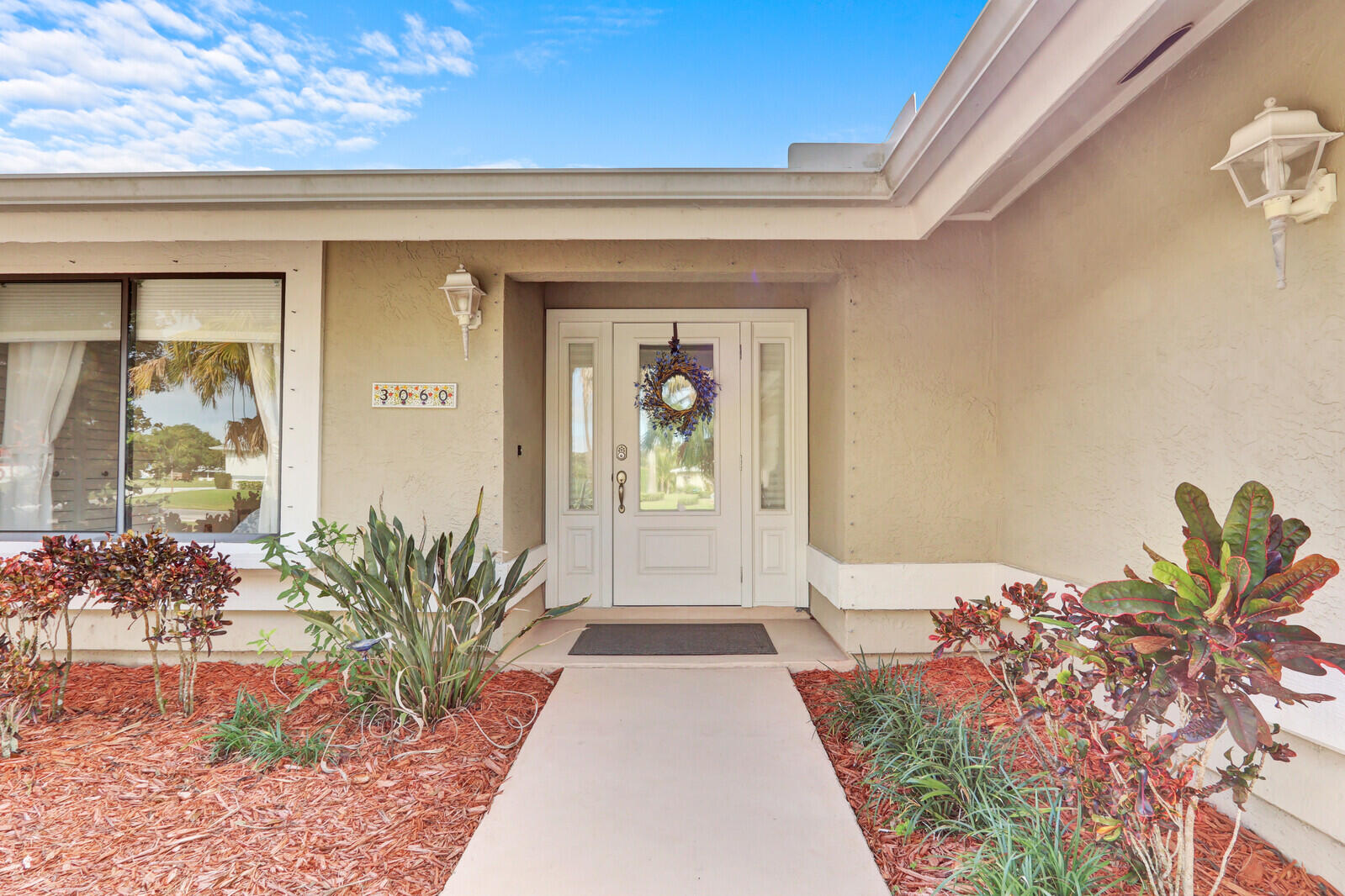 3060 Southeast Darien Road Port St. Lucie, FL 34952 - Photo 53 of 56 a front view of a house