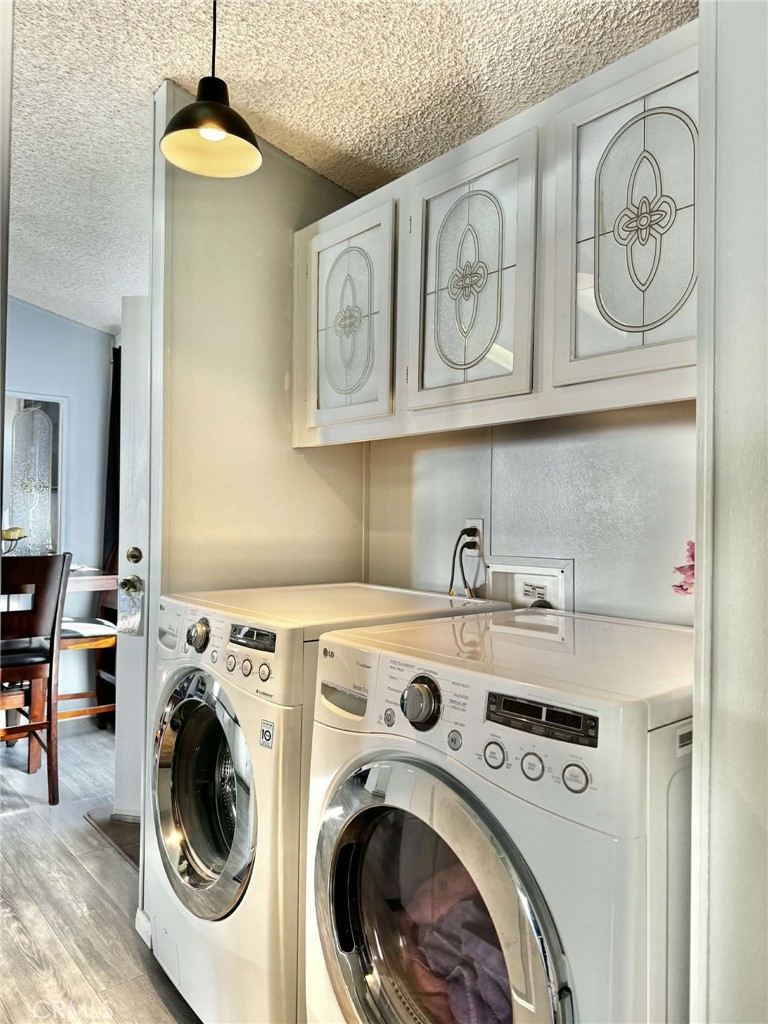 8811 Park Street, Unit 54 Bellflower, CA 90706 - Photo 9 of 13 a utility room with dryer and washer