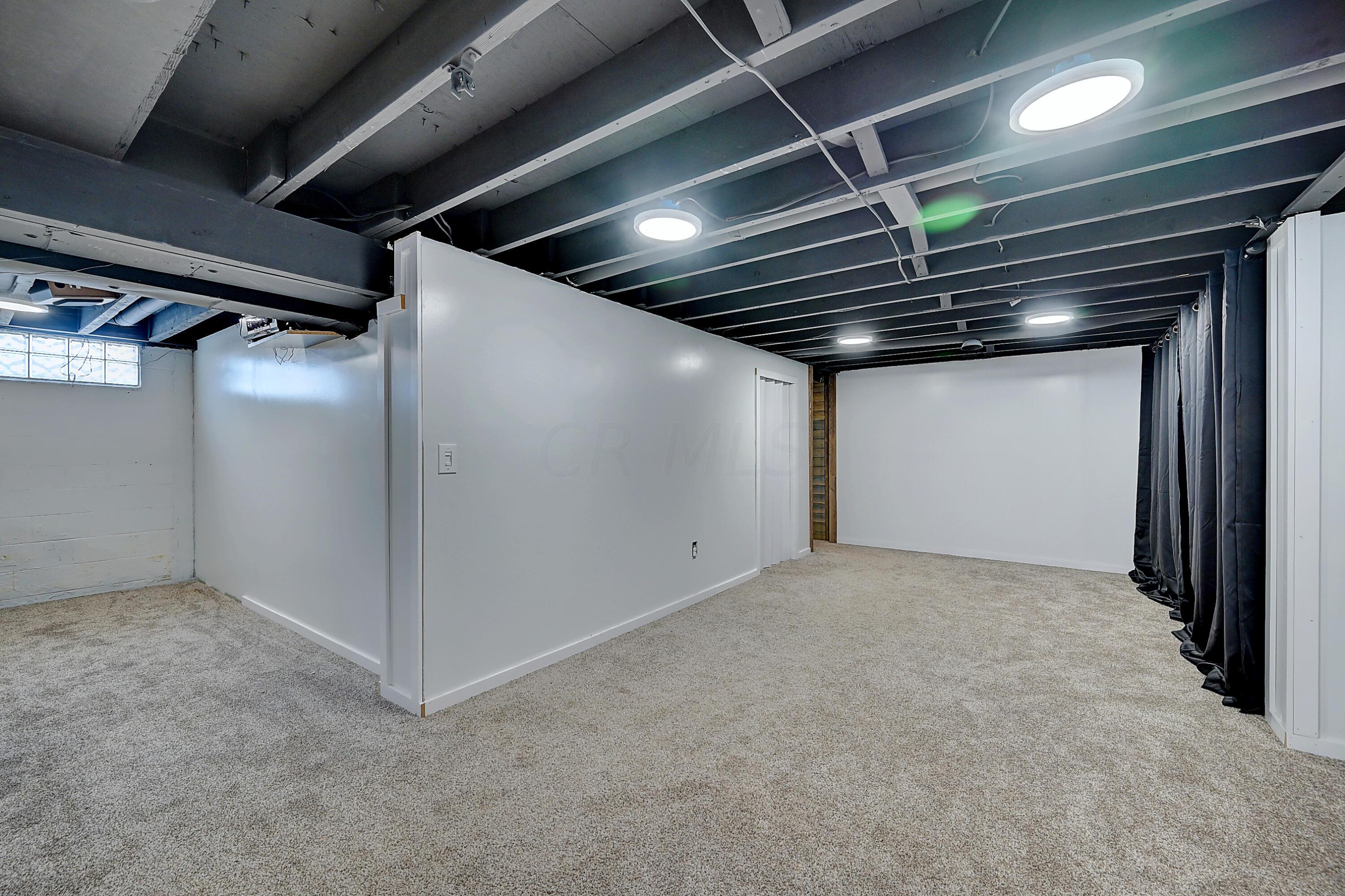 5594 Norcross Road Columbus, OH 43229 - Photo 24 of 33 Basement entertaining area
