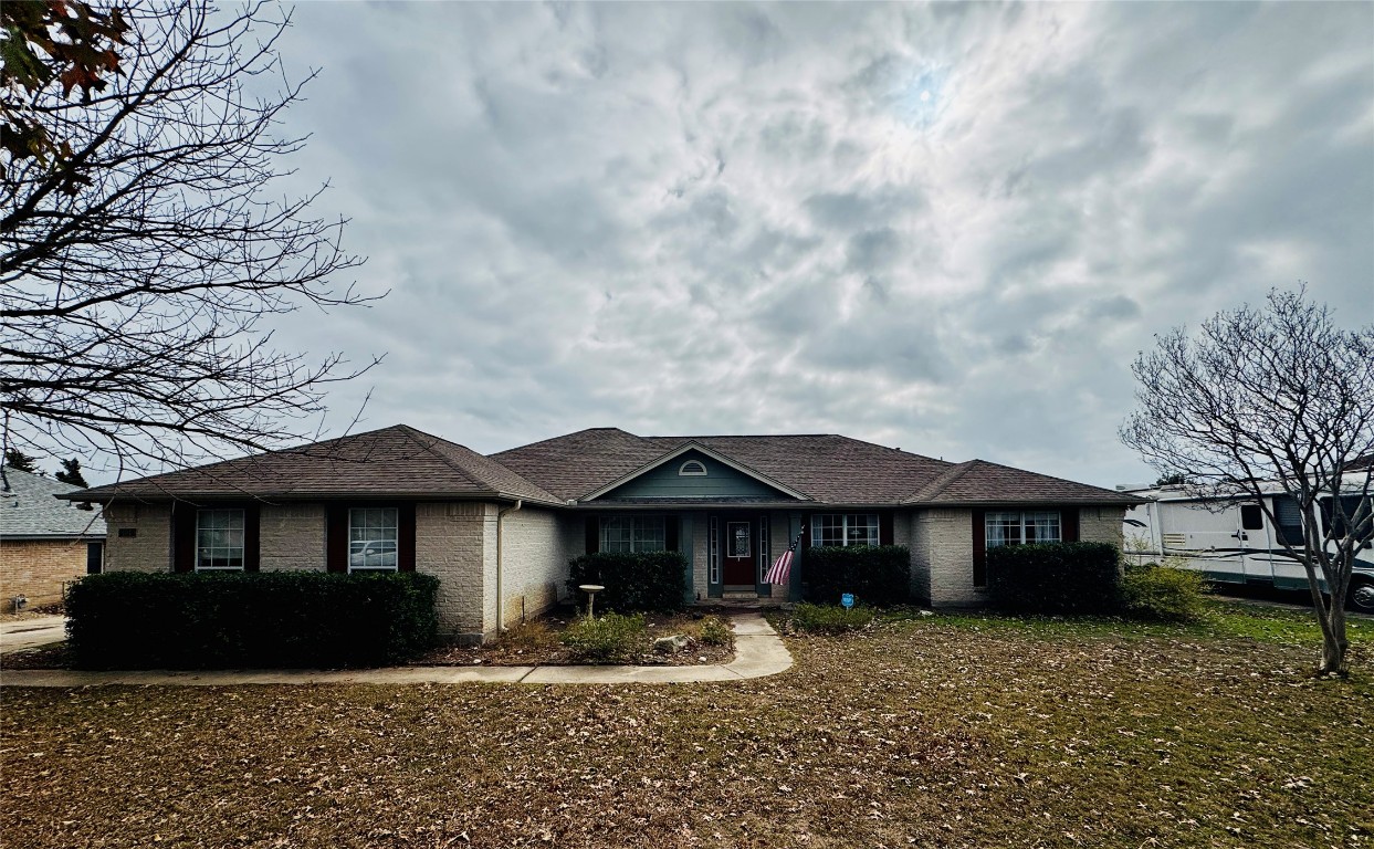 104 Silk Tree Lane Round Rock, TX 78664 - Photo 1 of 29 a front view of a house with garden