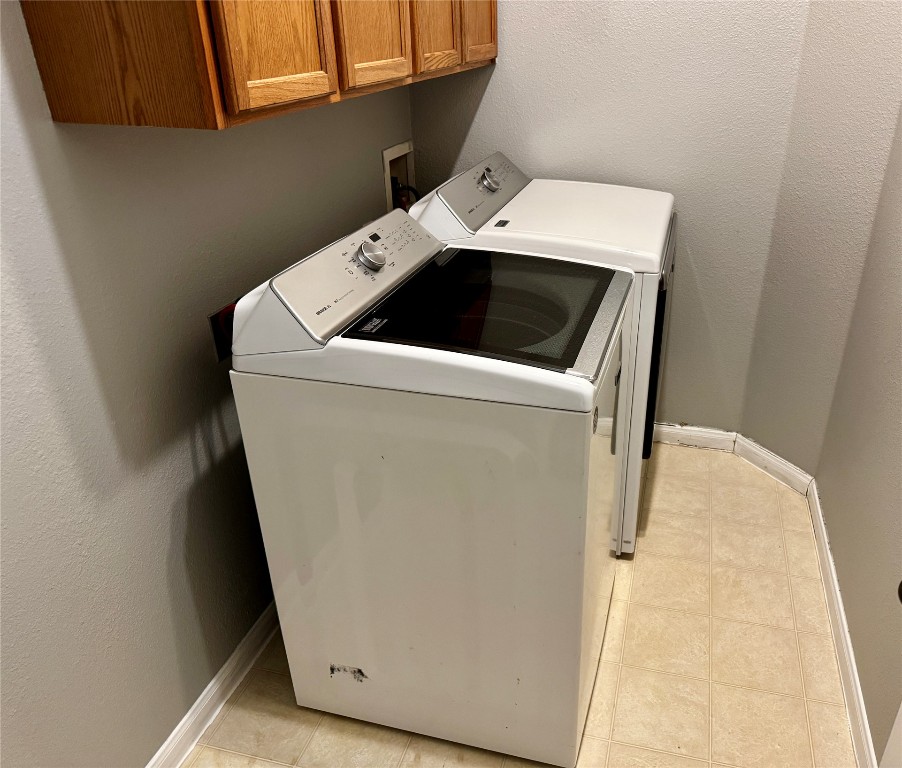 104 Silk Tree Lane Round Rock, TX 78664 - Photo 22 of 29 a utility room with dryer and washer