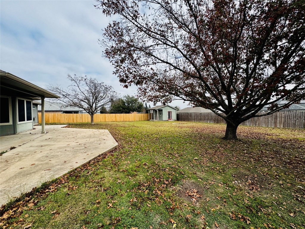 104 Silk Tree Lane Round Rock, TX 78664 - Photo 26 of 29 a house with trees in front of it