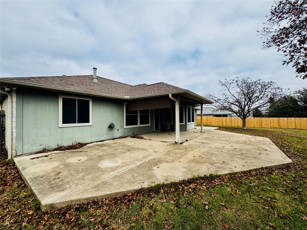 104 Silk Tree Lane Round Rock, TX 78664 - Photo 27 of 29 a front view of a house with a garden