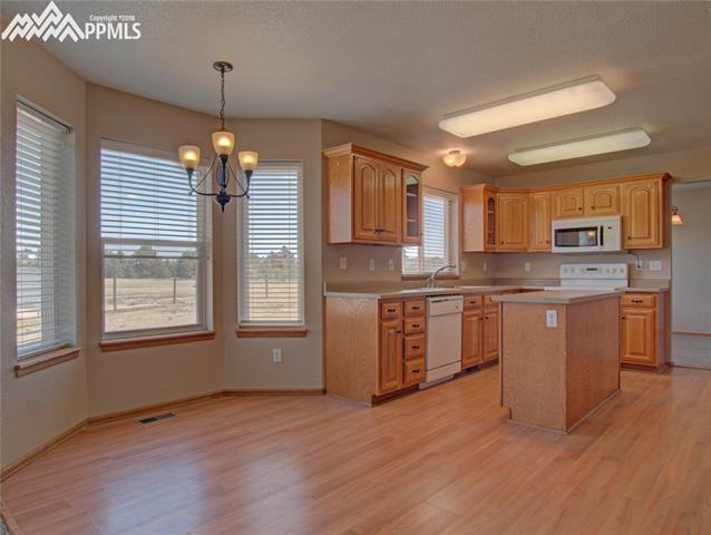 8380 Tannenbaum Road Colorado Springs, CO 80908 - Photo 10 of 22 Breakfast nook