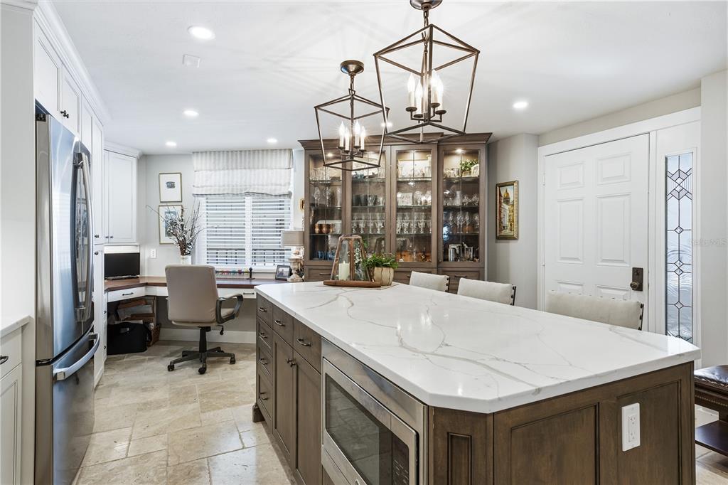 5880 Midnight Pass Road, Unit 302 Sarasota, FL 34242 - Photo 12 of 97 a very nice looking dining room with a table and chairs