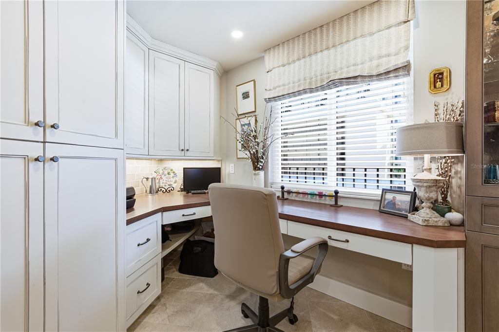 5880 Midnight Pass Road, Unit 302 Sarasota, FL 34242 - Photo 15 of 97 a view of a workspace with furniture and a window