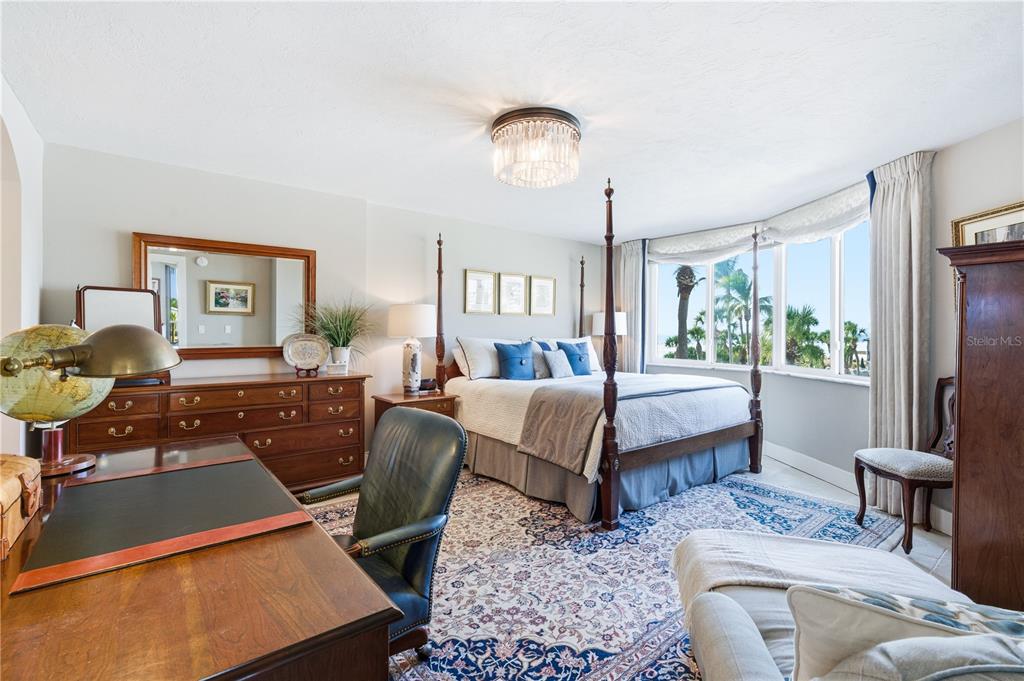 5880 Midnight Pass Road, Unit 302 Sarasota, FL 34242 - Photo 30 of 97 a living room with furniture and a large window