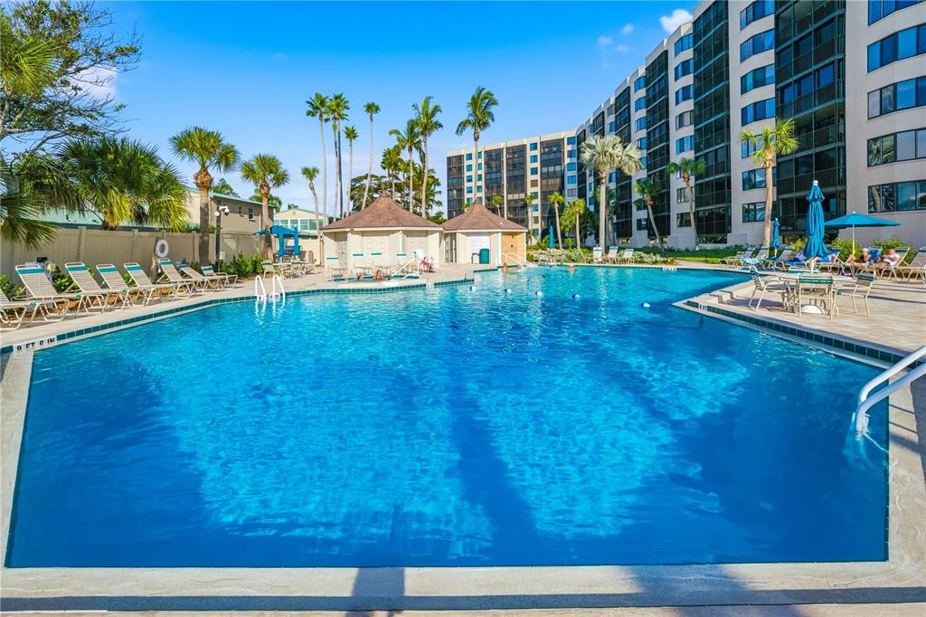 5880 Midnight Pass Road, Unit 302 Sarasota, FL 34242 - Photo 68 of 97 a view of swimming pool with outdoor seating