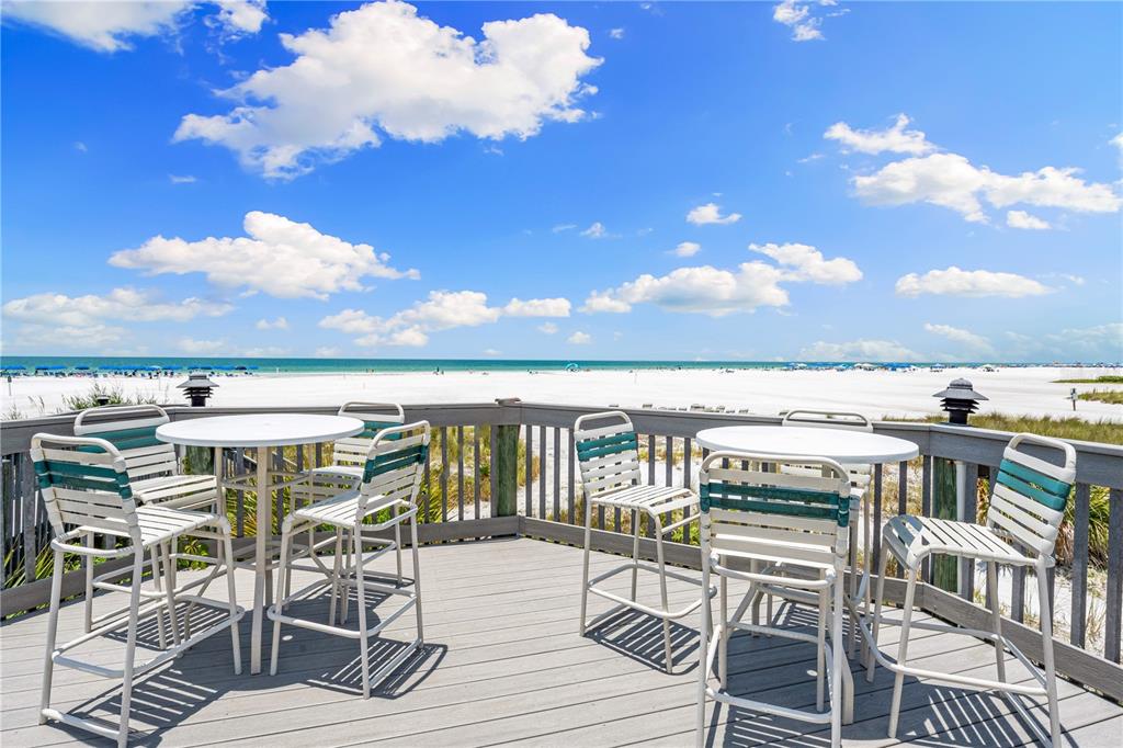 5880 Midnight Pass Road, Unit 302 Sarasota, FL 34242 - Photo 74 of 97 a view of a balcony with chairs