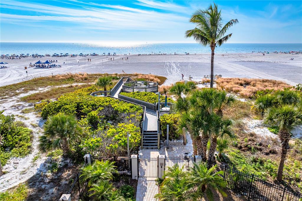 5880 Midnight Pass Road, Unit 302 Sarasota, FL 34242 - Photo 75 of 97 a view of a yard with an outdoor space