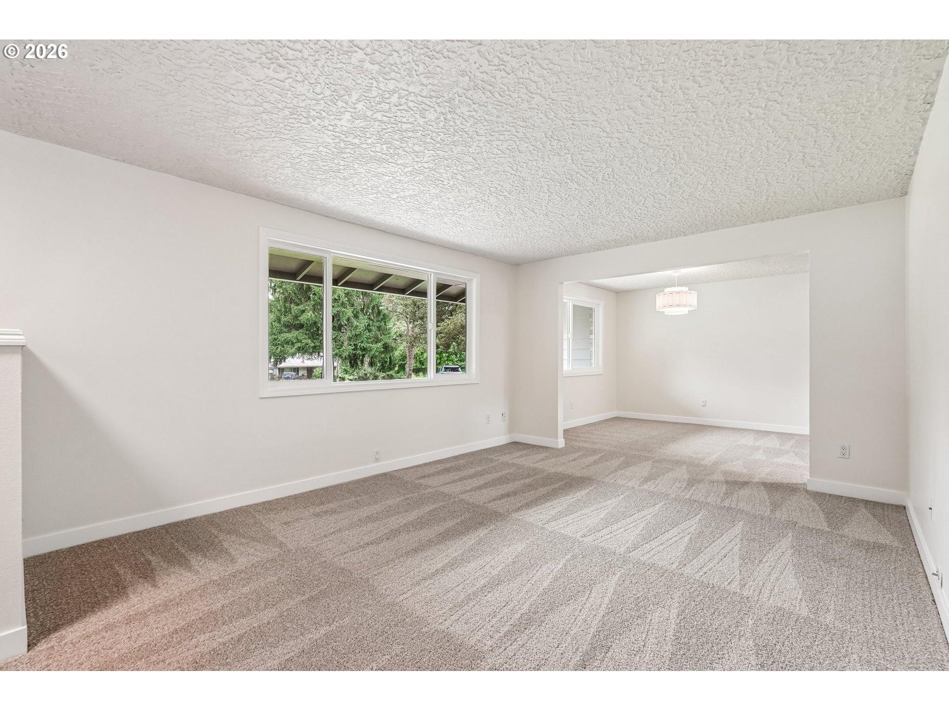 22600 Northeast 28th Street Camas, WA 98607 - Photo 5 of 48 an empty room with wooden floor and windows