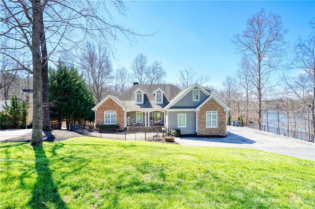 6385 Reives Road Cumming, GA 30041 - Photo 1 of 1 Amazing ranch home located at Six Mile, only a few miles from GA400. Quiet cove with amazing views from every room in the house. Come see!