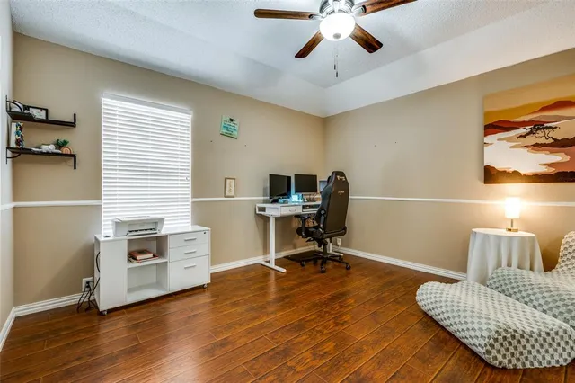 wooden floor and window in an empty room