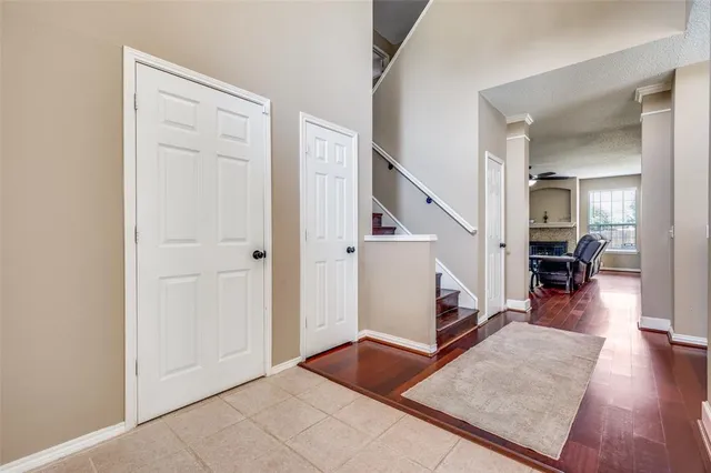 a view of a livingroom with furniture and wooden floor