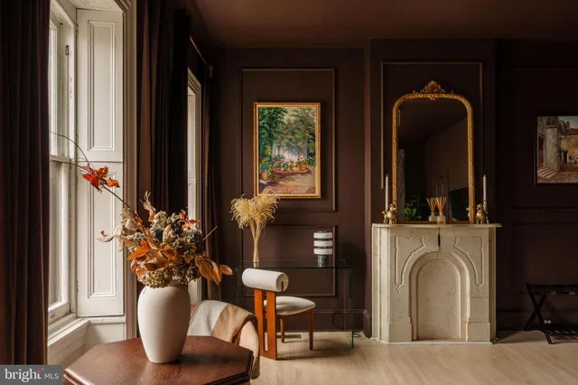 a view of living room with furniture and a large window