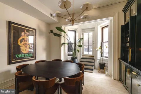 a kitchen with a cabinets and a window