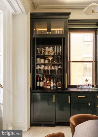 a living room with a couch and a window