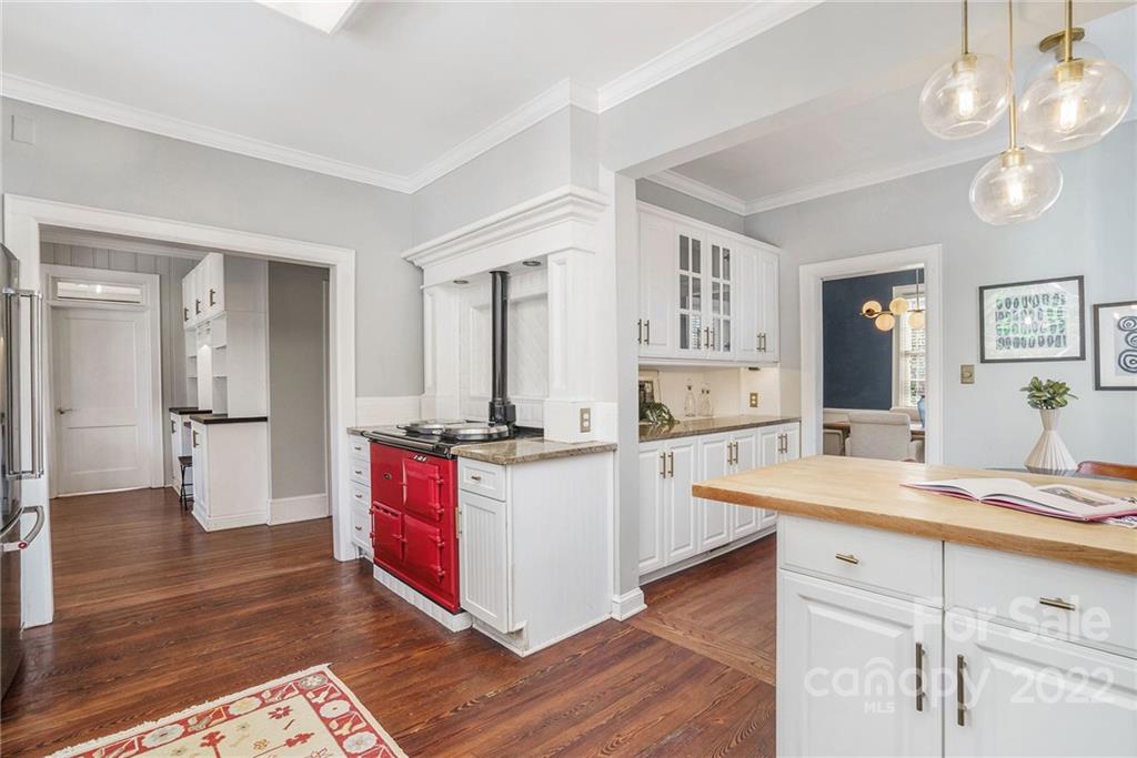 1520 Paddock Circle Charlotte, NC 28209 - Photo 15 of 39 a kitchen with stainless steel appliances granite countertop a sink stove and refrigerator
