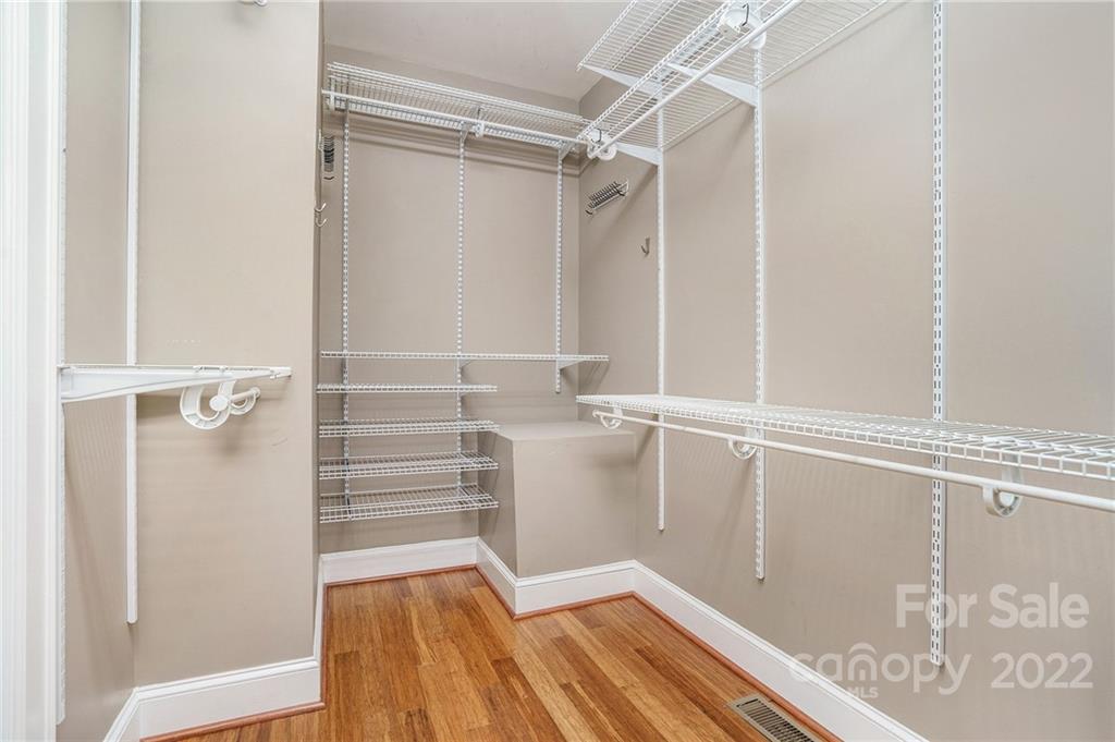 1520 Paddock Circle Charlotte, NC 28209 - Photo 23 of 39 a view of walk in closet with empty racks