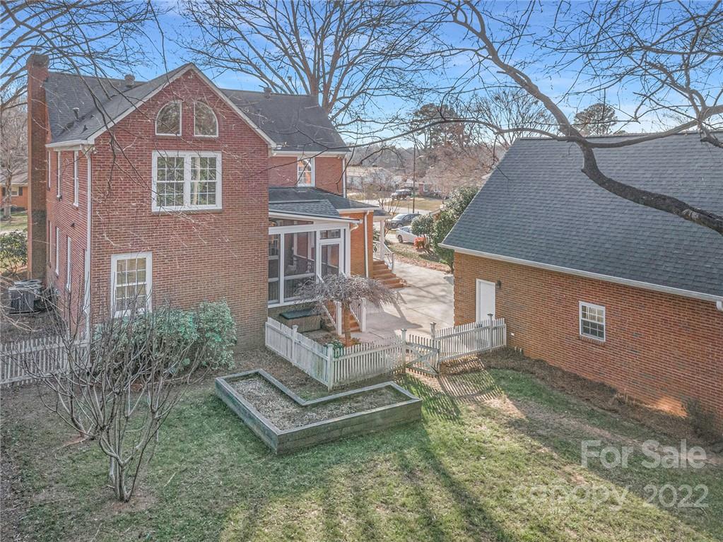 1520 Paddock Circle Charlotte, NC 28209 - Photo 37 of 39 a front view of a house with a yard
