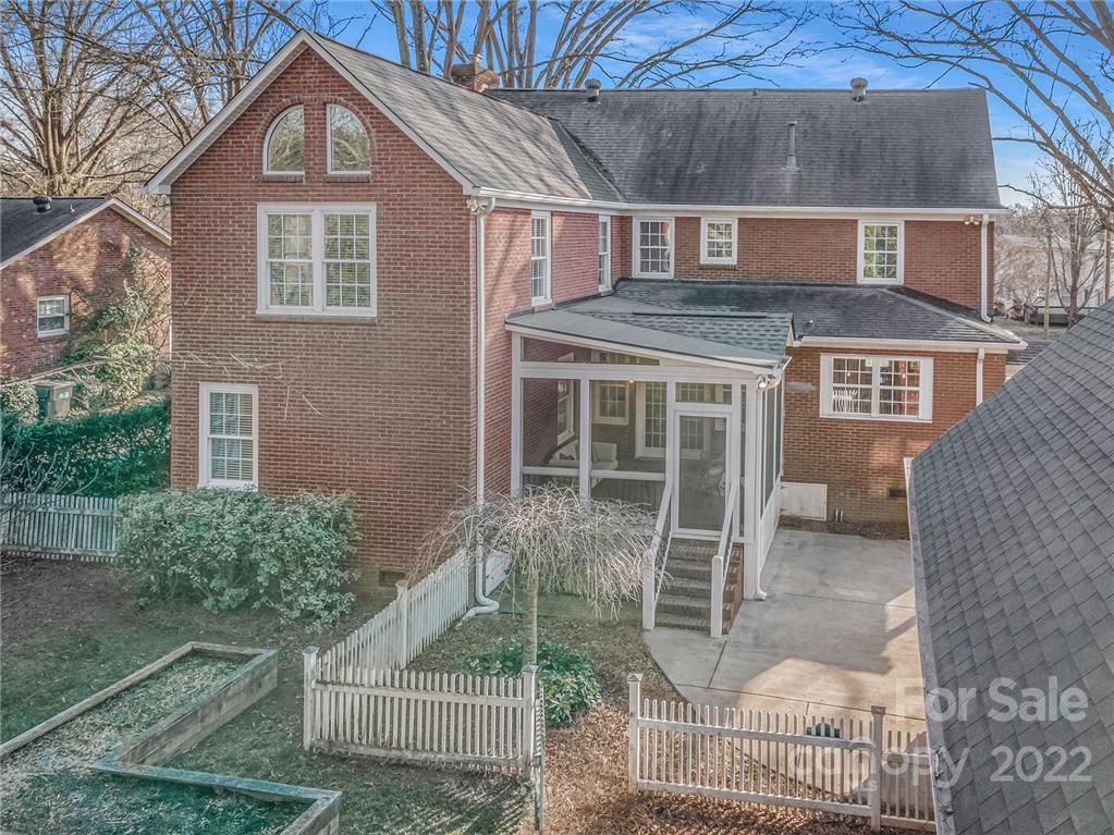 1520 Paddock Circle Charlotte, NC 28209 - Photo 38 of 39 a front view of a house with a garden