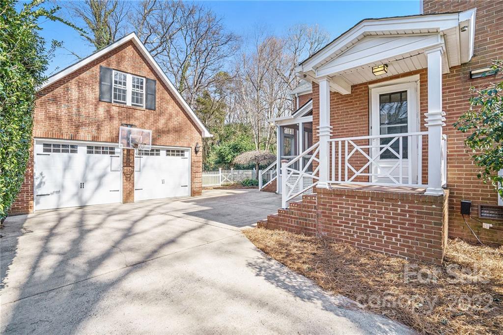 1520 Paddock Circle Charlotte, NC 28209 - Photo 4 of 39 a front view of a house with a yard