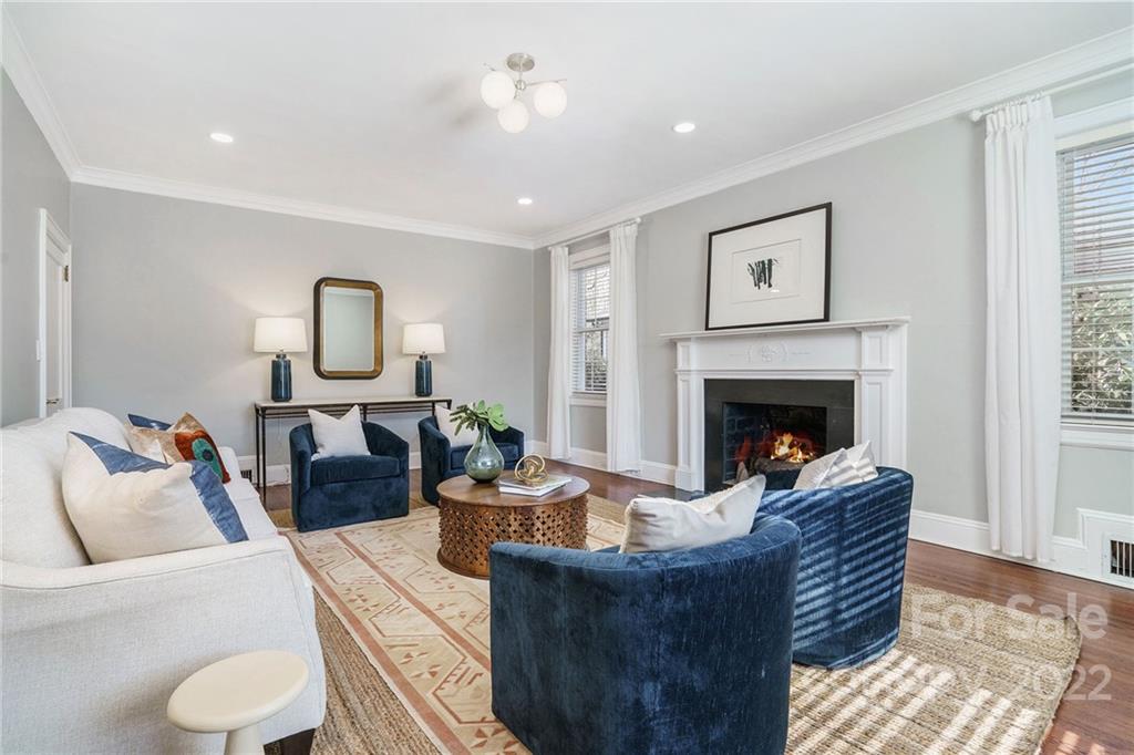 1520 Paddock Circle Charlotte, NC 28209 - Photo 7 of 39 a living room with furniture and a fireplace