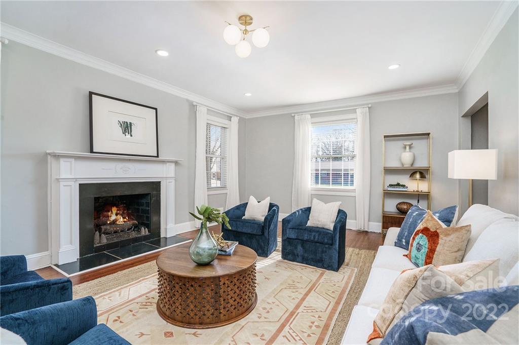 1520 Paddock Circle Charlotte, NC 28209 - Photo 8 of 39 a living room with furniture and a fireplace