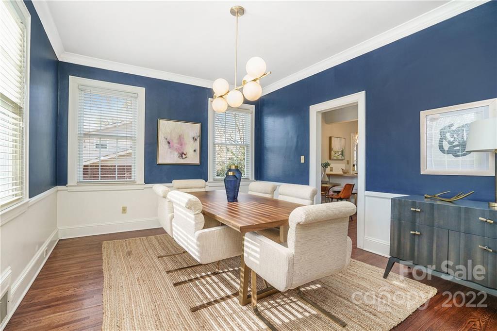 1520 Paddock Circle Charlotte, NC 28209 - Photo 10 of 39 a living room with couches a coffee table and next to a window with wooden floor