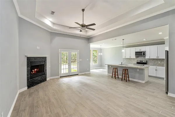 a view of a kitchen with microwave and stove