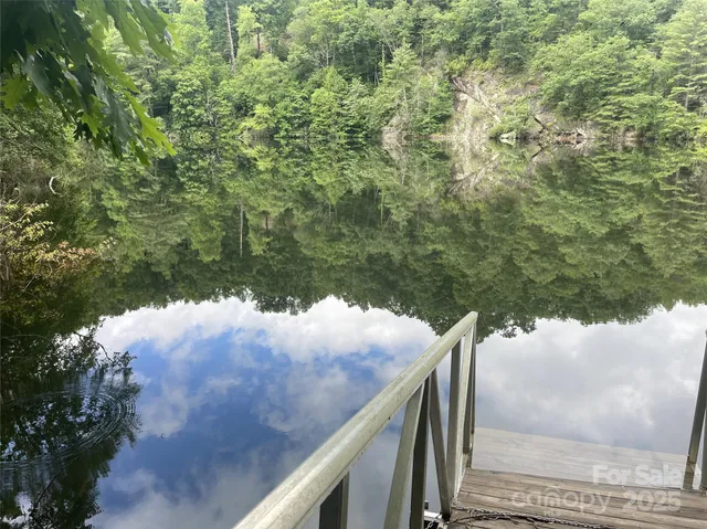 a view of a yard from a balcony