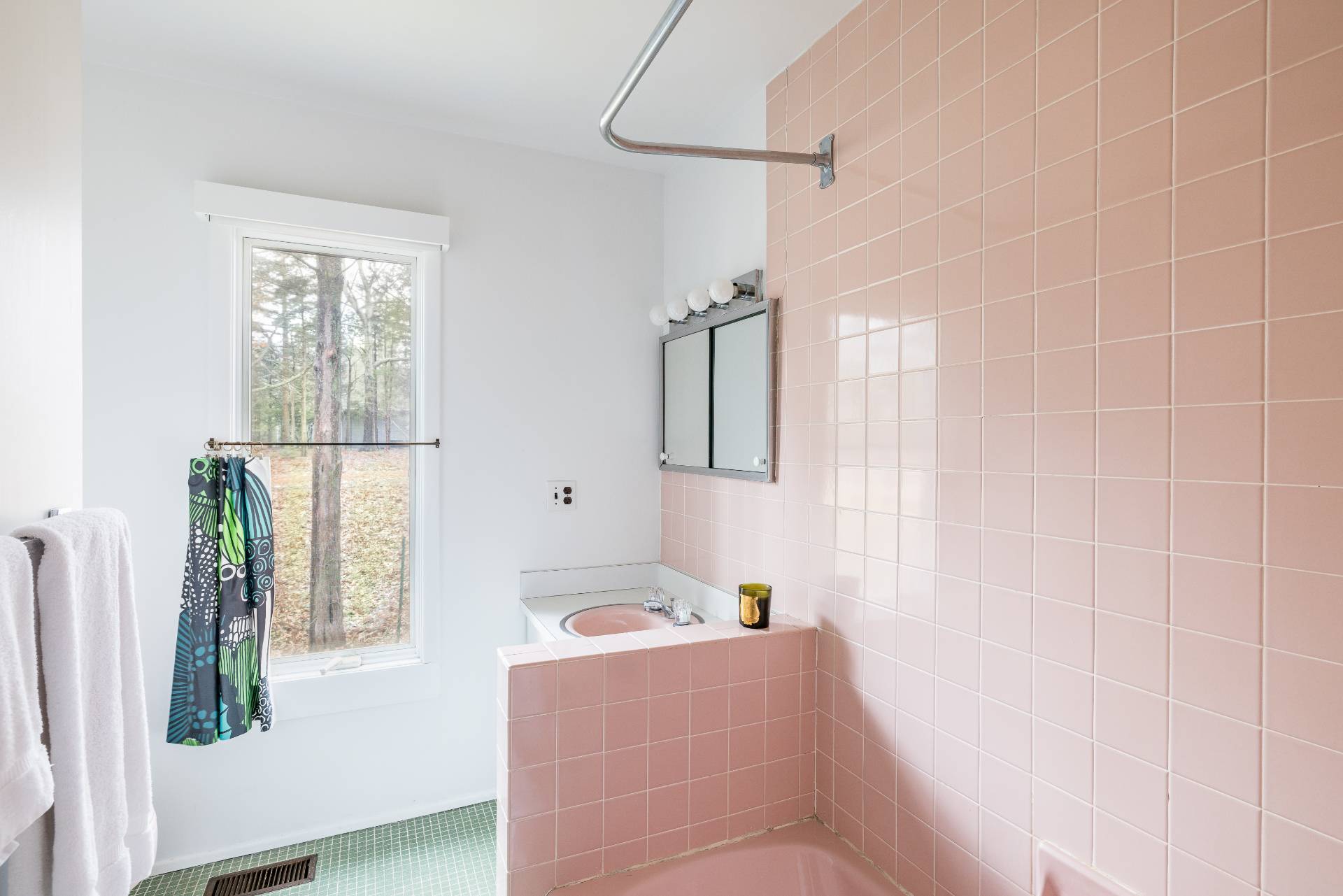 291 Three Mile Harbor Road East Hampton, NY 11937 - Photo 14 of 17 a bathroom with a tub a sink and a window